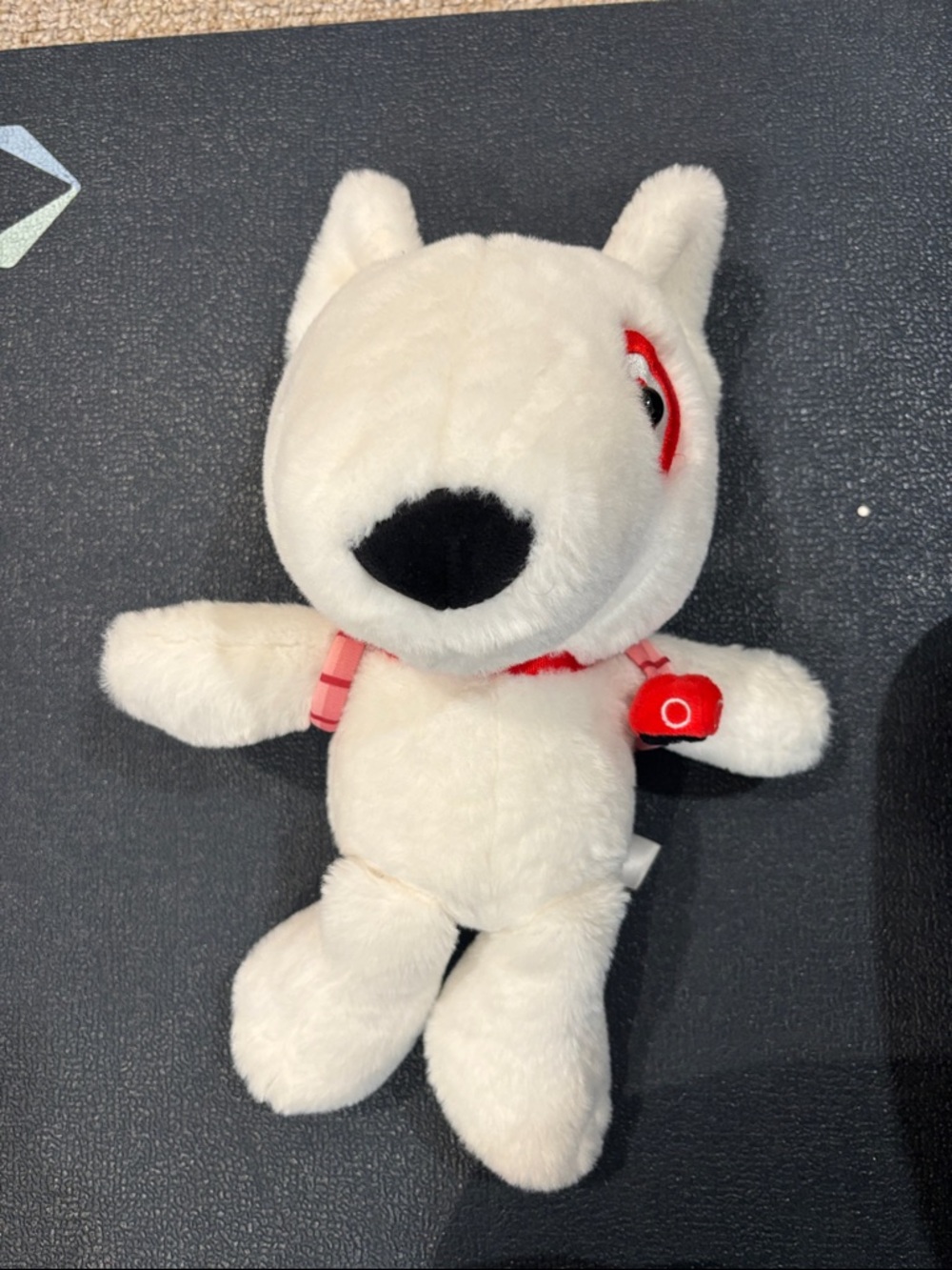 Target Bullseye Plush White Dog Toy with Red Collar.